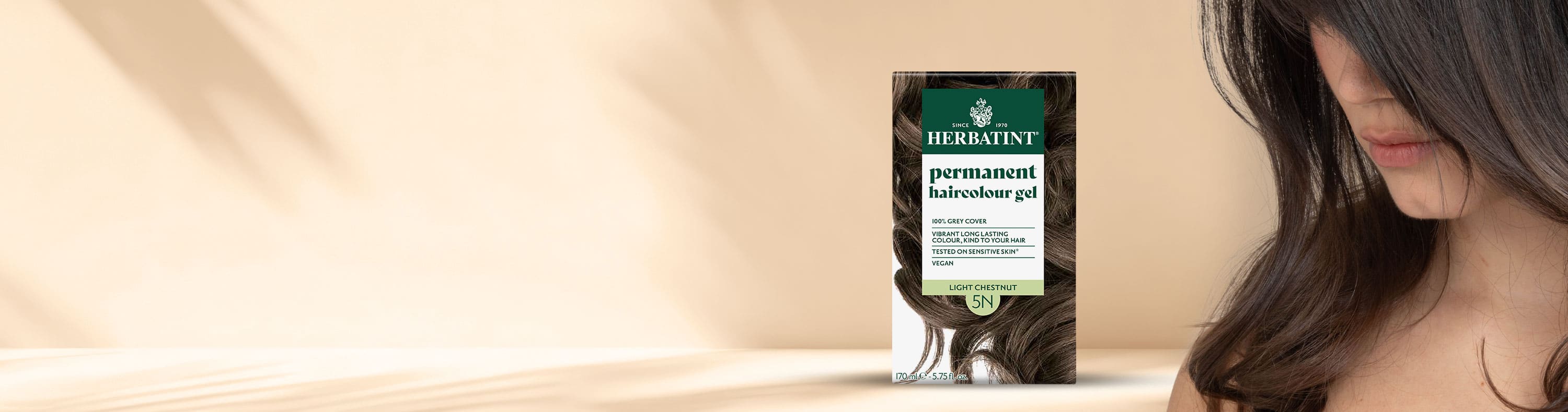 Herbatint 5N light brown permanent hair dye 170 ml box featuring a brown-haired model on an illuminated beige background