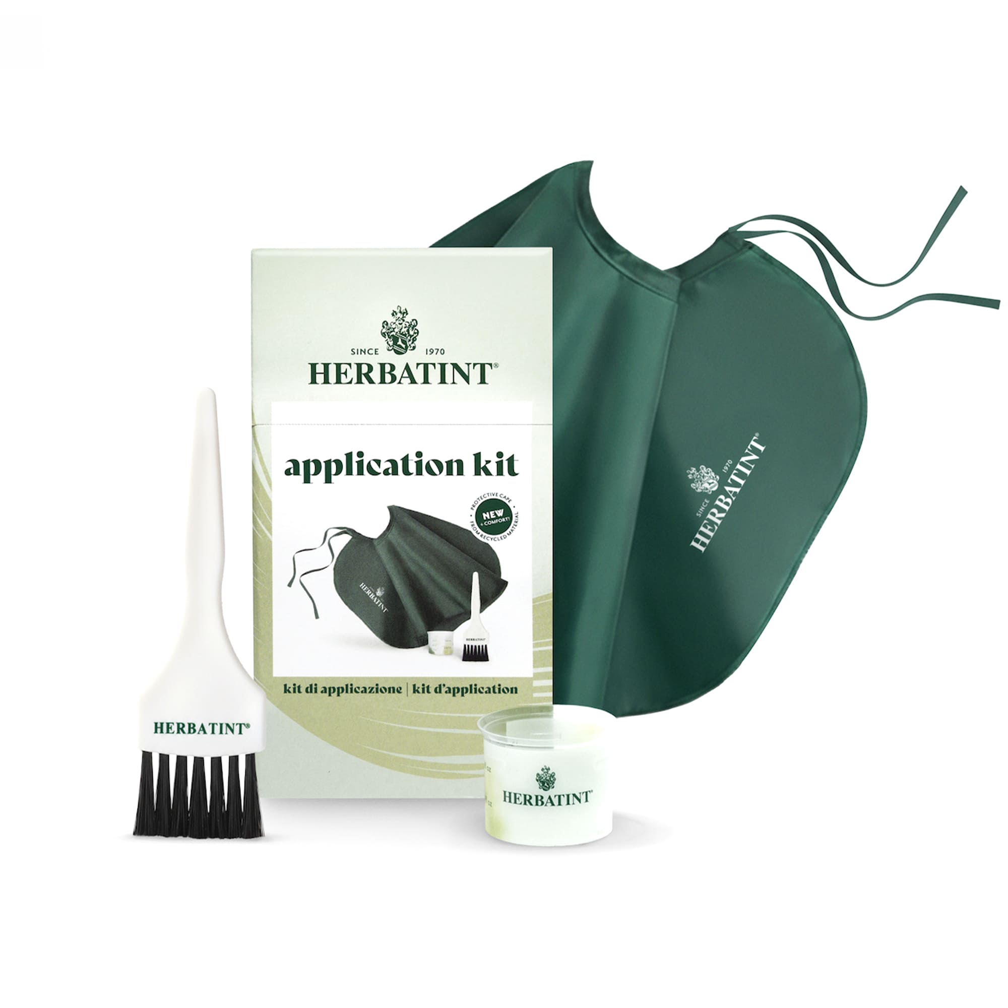 Contenuto confezione kit di applicazione per la colorazione dei capelli. Contenente pennello, mantellina protettiva e misurino dosatore.