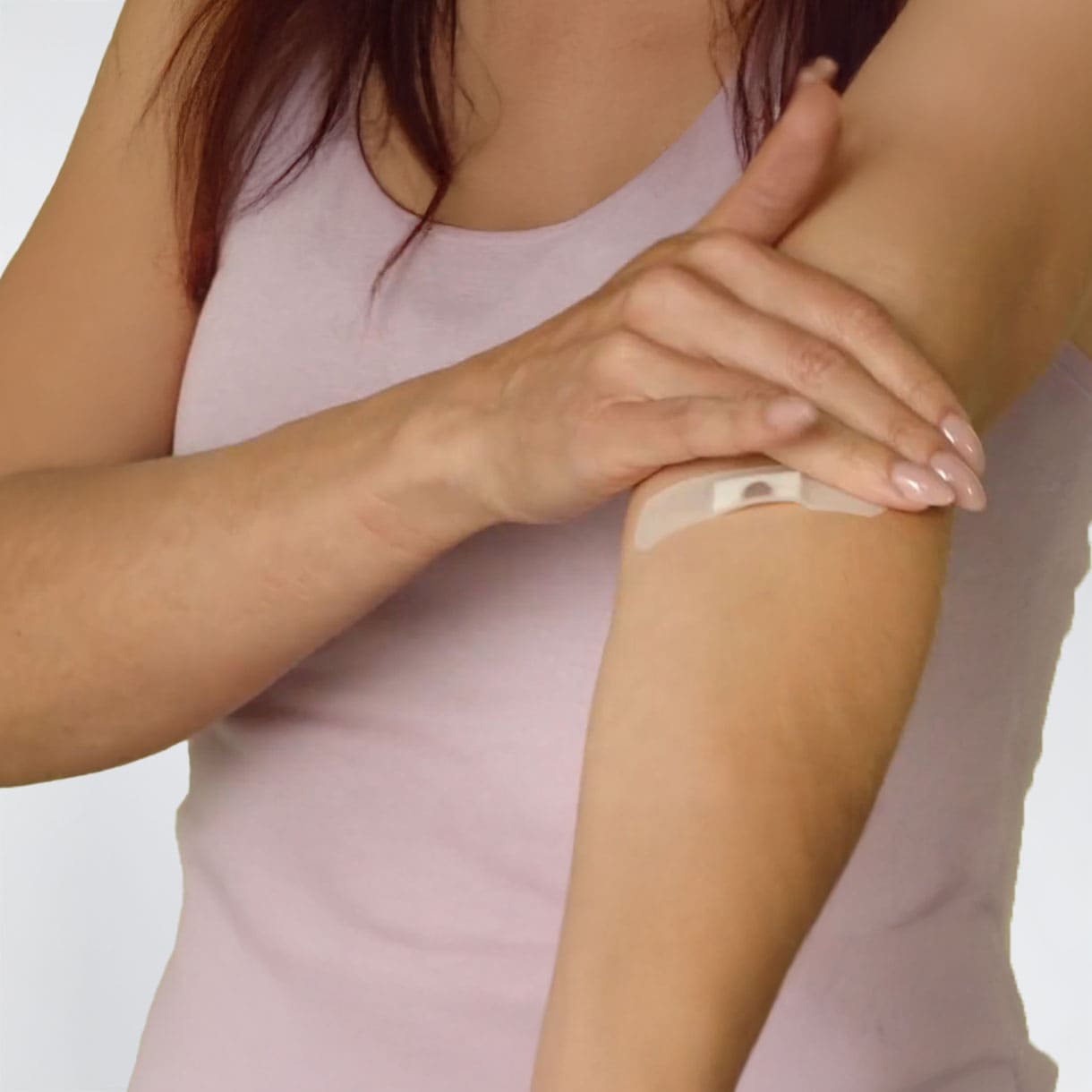 Patchtest met een kleefpleister aan de binnenkant van de arm vóór het kleuren met Herbatint